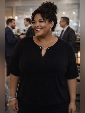 Micheal Kors black top with silver detailing. Perfect for work or date night!